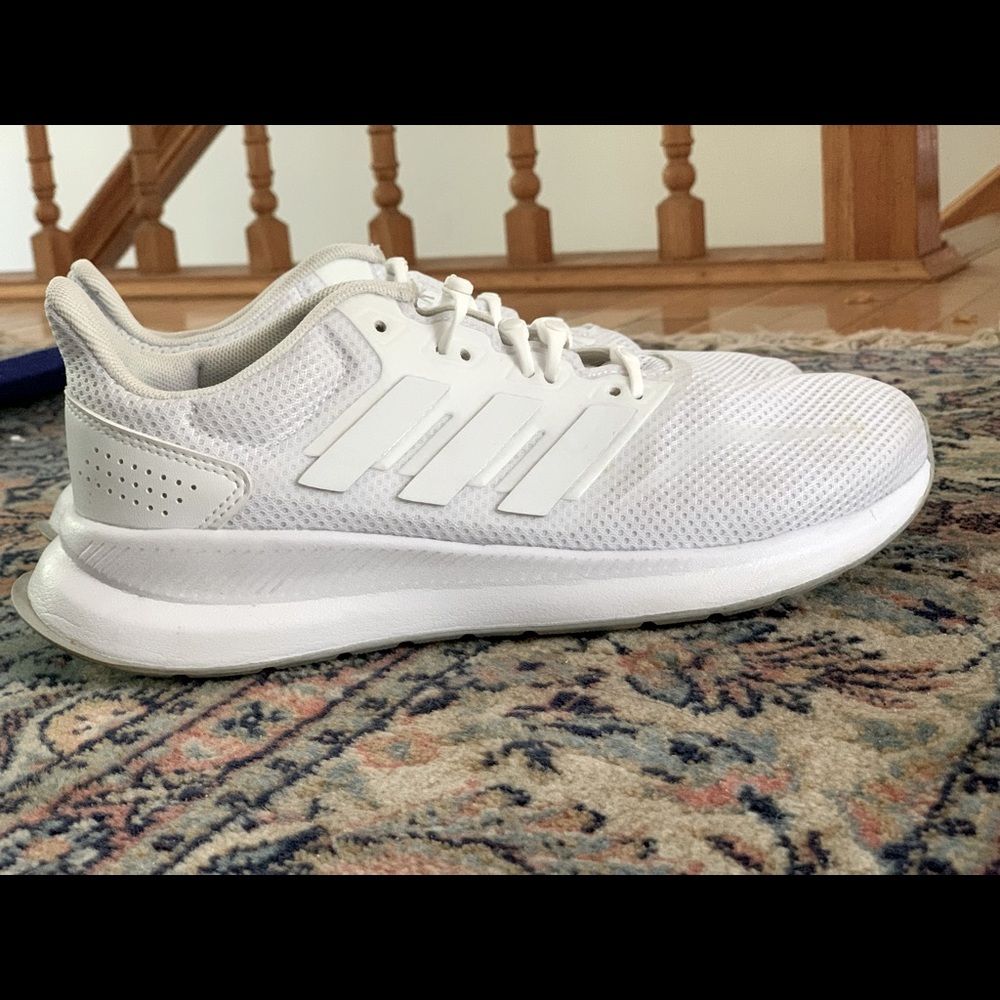 All white Adidas sneakers